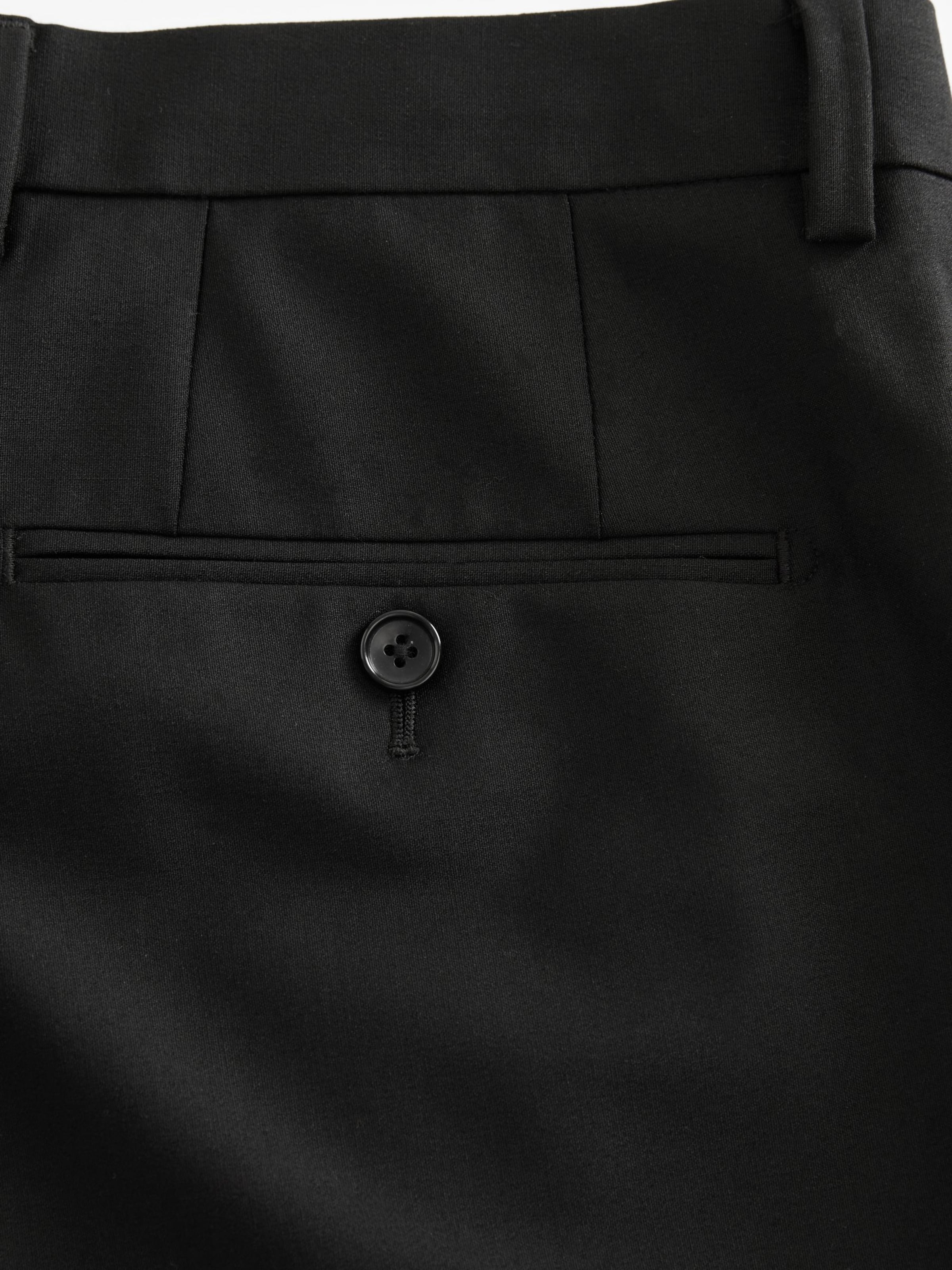 Next Zwężany krój Spodnie w kant 'Motionflex' w kolorze czarny