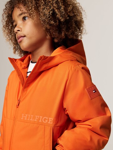 TOMMY HILFIGER Übergangsjacke in Orange