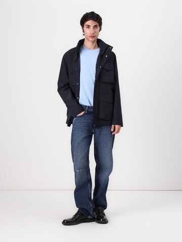 TOMMY HILFIGER Välikausitakki värissä sininen