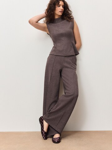 pilka Next Plačios klešnės Kelnės