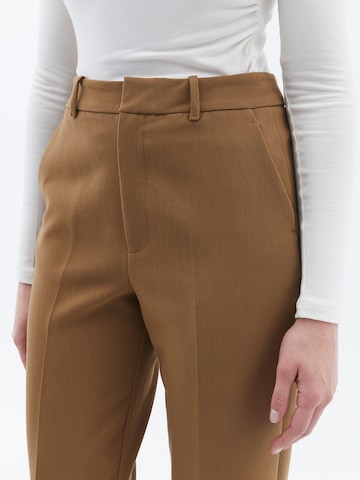 Tapered Pantaloni con piega frontale di OXXO in marrone