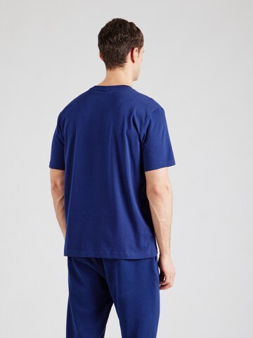 Maglietta di Champion Authentic Athletic Apparel in blu