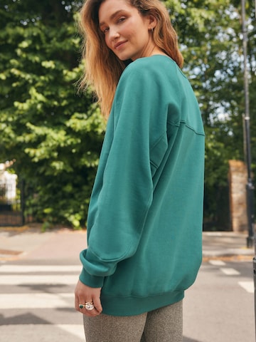 Bluză de molton de la Next pe verde