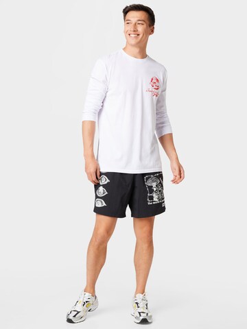 Tricou funcțional de la QUIKSILVER pe alb