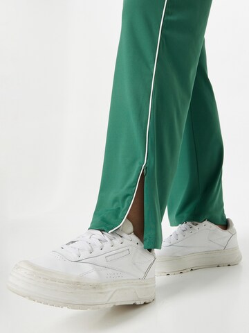 Cotton On Ohlapna forma Športne hlače | zelena barva