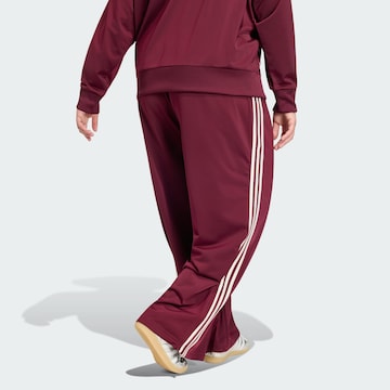 ADIDAS ORIGINALS - Loosefit Pantalón 'Firebird' en rojo