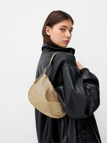 Bershka Skuldertaske i guld