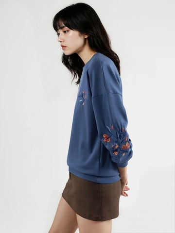 Sweat-shirt Hiccup en bleu