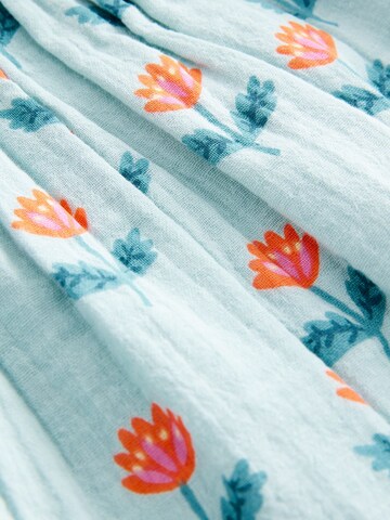 Ensemble Next en bleu