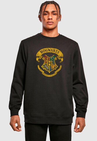 ABSOLUTE CULT Sweatshirt 'Harry Potter - Hogwarts Ribbon Crest' in Zwart: voorkant