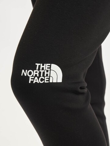 THE NORTH FACE Skinny Sportbroek ' Interlock Cotton Face' in Zwart