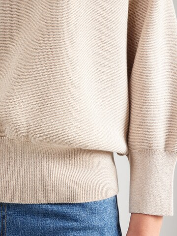 bēšs monari Džemperis