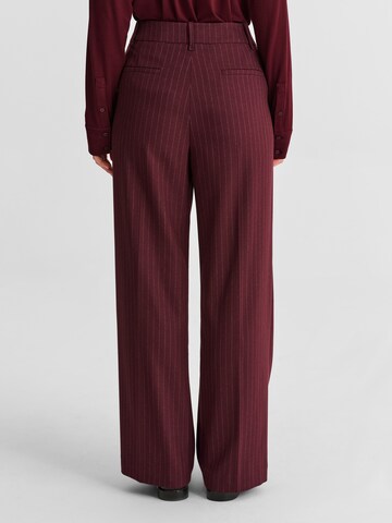 regular Pantaloni con piega frontale 'Zariana 1' di TATUUM in rosso