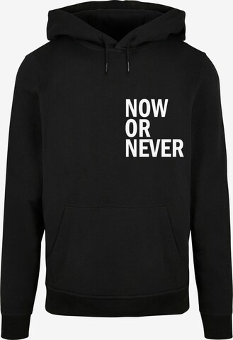 Sweat-shirt 'Now Or Never' Merchcode en noir : devant