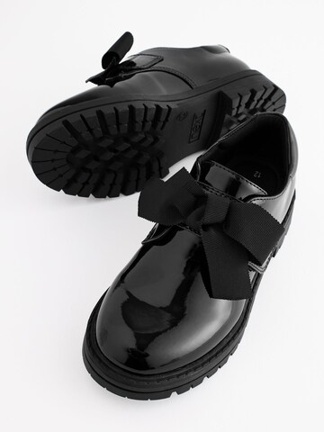 Next Flats in Black