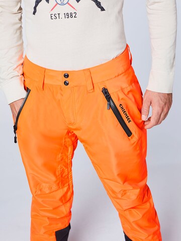 Regular Pantalon outdoor CHIEMSEE en orange