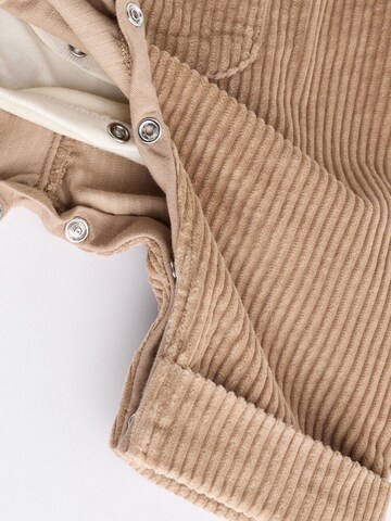 Set Next en marron