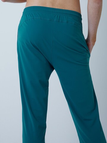 Coupe slim Pantalon de sport 'Slim Training Pants' SPORTKIND en vert