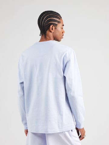 Nike Sportswear T-shirt 'Premium Essentials' i grå