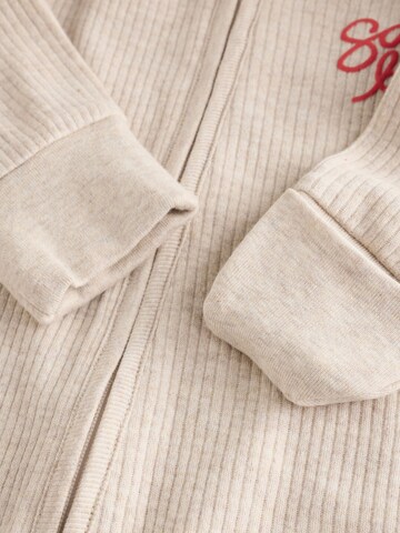 Pigiama di Next in beige