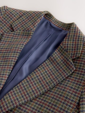 Sacou de la Next pe maro