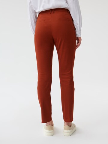 Regular Pantalon 'MISATI' TATUUM en orange