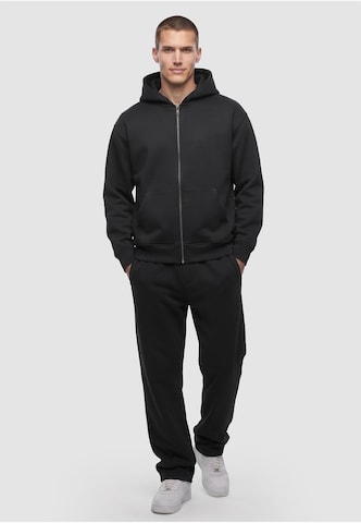 Urban Classics Loose fit Pants in Black: front