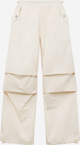 Karl Kani Loose fit Trousers in Beige: front