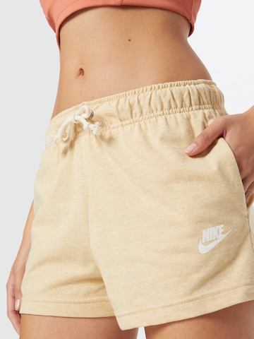Nike Sportswear Normalny krój Spodnie w kolorze beżowy