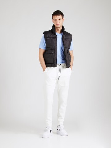 Tapered Pantaloni di Champion Authentic Athletic Apparel in bianco