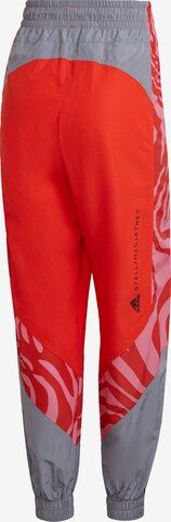 ADIDAS BY STELLA MCCARTNEY Tapered Workout Pants in Orange