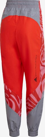 ADIDAS BY STELLA MCCARTNEY Tapered Sporthose in Orange