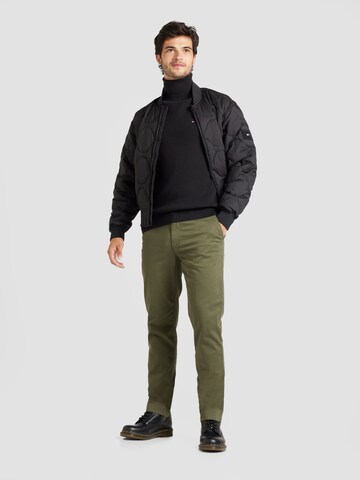 TOMMY HILFIGER Tussenjas 'Onion' in Zwart