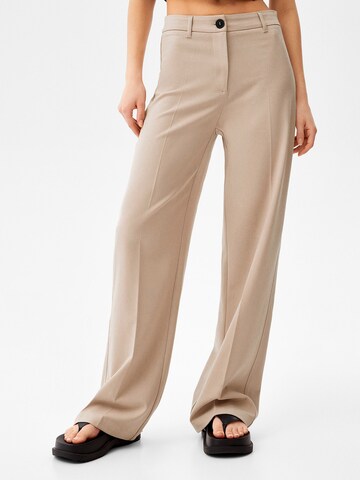 Bershka Wide leg Pleated Pants in Beige: front