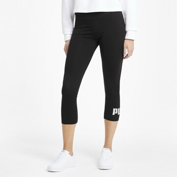 Skinny Pantalon de sport 'Essentials' PUMA en noir : devant
