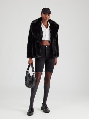 Veste mi-saison 'FOURRURES' The Kooples en noir