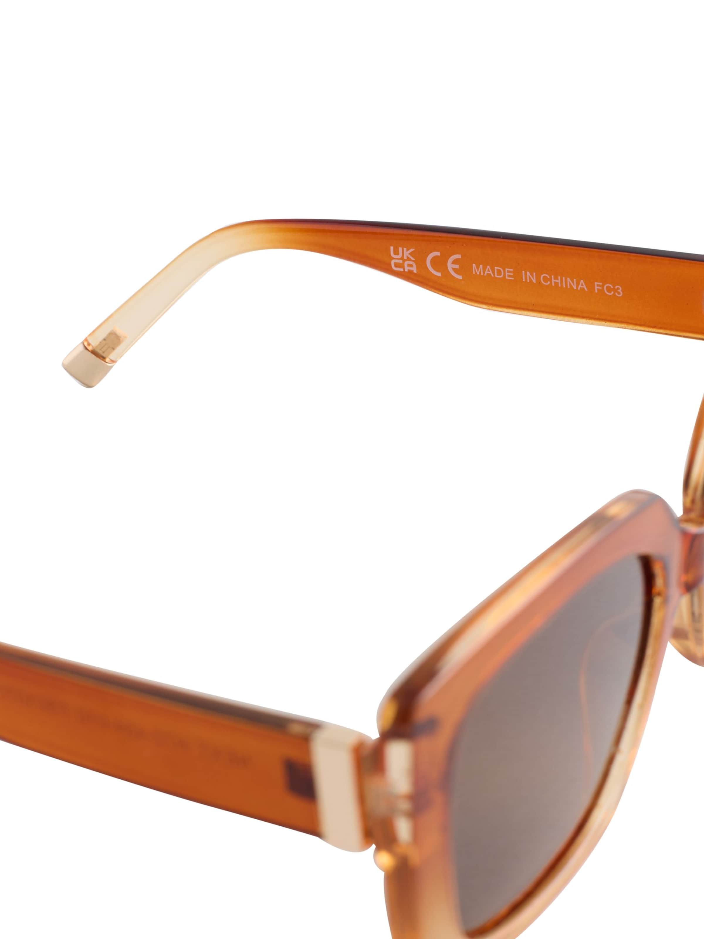 Next Sončna očala | oranžna barva