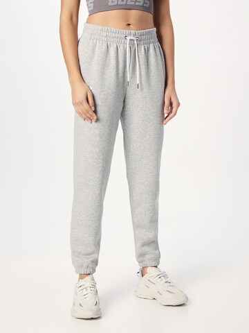 UNDER ARMOUR Tapered Workout Pants 'Essential' in Grey: front