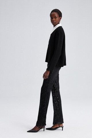 Touche Prive Strickjacke in Schwarz