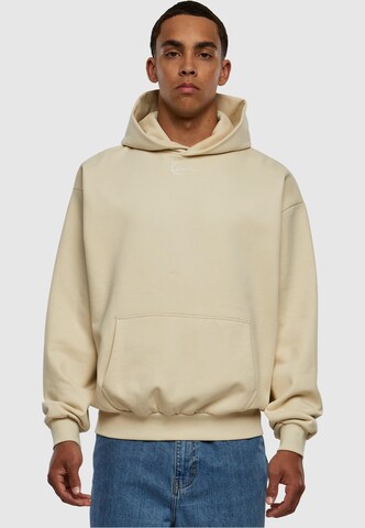 Sweat-shirt ' Small Signature' Karl Kani en beige : devant