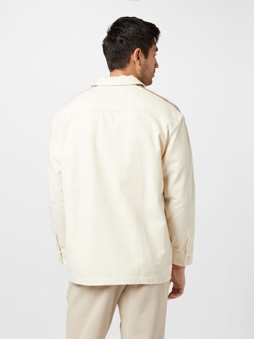 ADIDAS ORIGINALS Prehodna jakna 'Adicolor 70S Vintage' | bela barva
