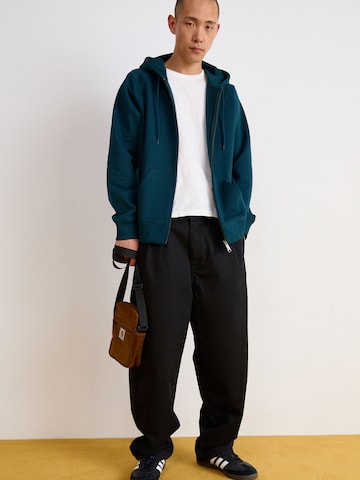 Wide leg Pantaloni con pieghe 'Merrick' di Carhartt WIP in nero