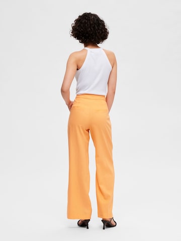 SELECTED FEMME Wide leg Trousers with creases in Orange