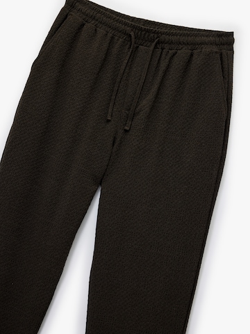 Koton Bootcut Broek in Bruin