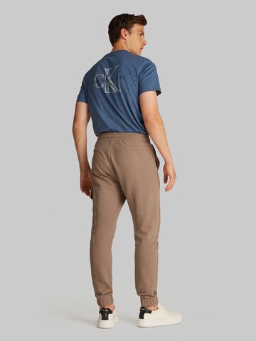 Calvin Klein Jeans Tapered Nadrág - szürke