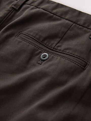 Next Lużny krój Spodnie w kolorze brązowy