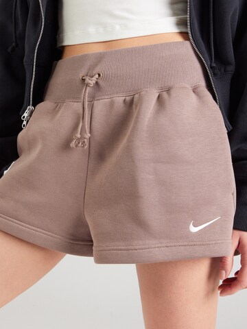 Nike Sportswear Loose fit Trousers 'Phoenix Fleece' in Brown