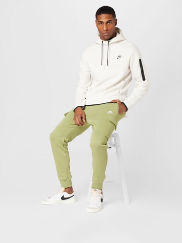 Nike Sportswear Tapered Hose in Grün