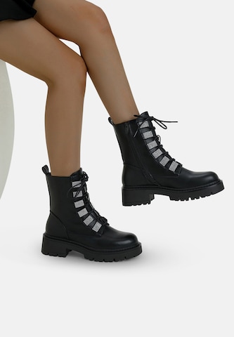 Elara Snørestøvletter i sort