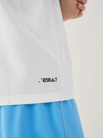 Next Paita värissä valkoinen